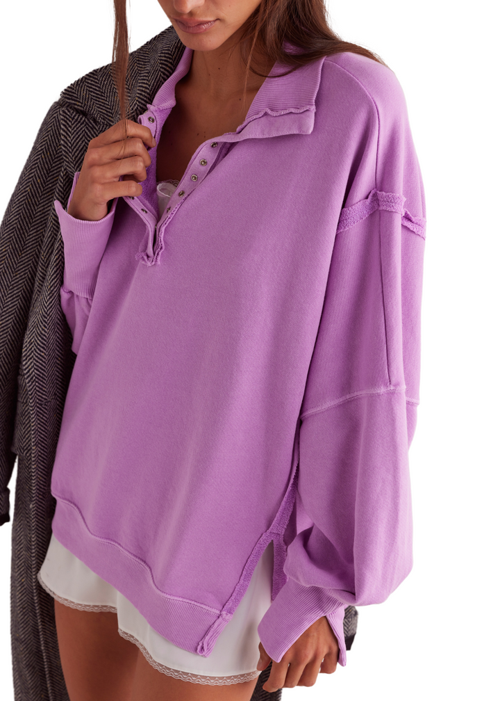 bright purple oversized collared henley sweatshirt with exposed seams