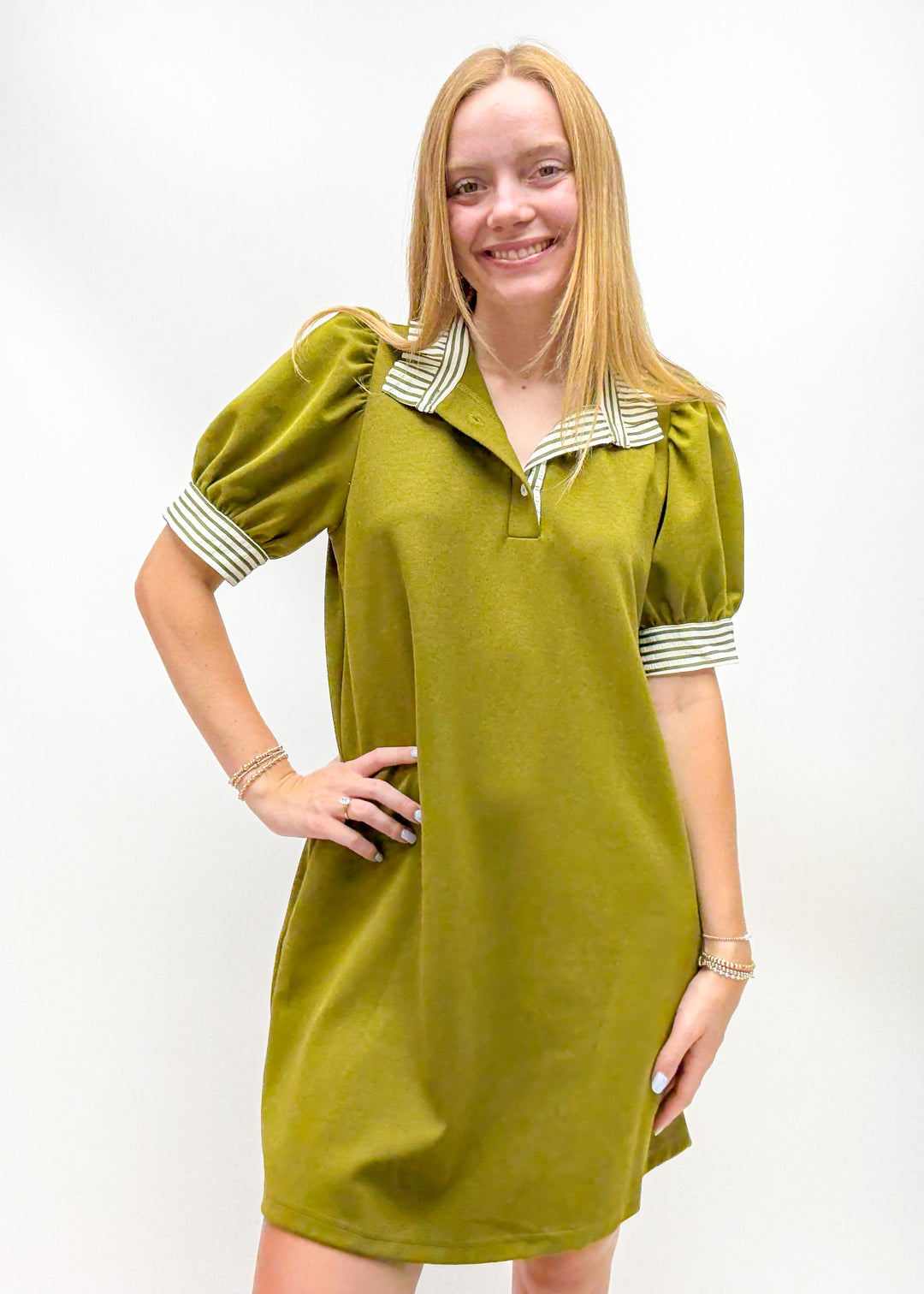 Women's olive green puff sleeve mini dress with stripe trim and ruffle collar