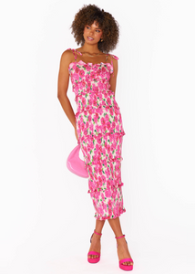 pink floral smocked maxi dress with riffle details and tie straps