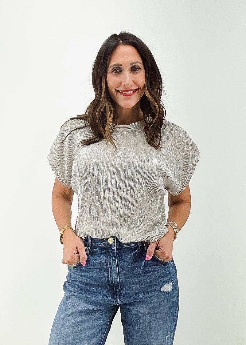 textured silver hip length blouse with short sleeves and crew neckline