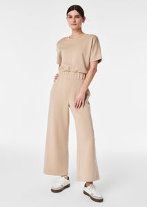 tan short sleeve crew neck wide leg cropped jumpsuit with thick elastic waistband