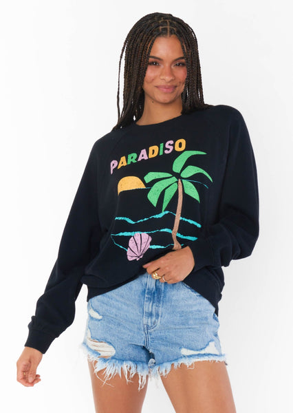 Black crew neck graphic sweatshirt with palm tree, seashell, sun, and multicolor letters that says "Paradiso"