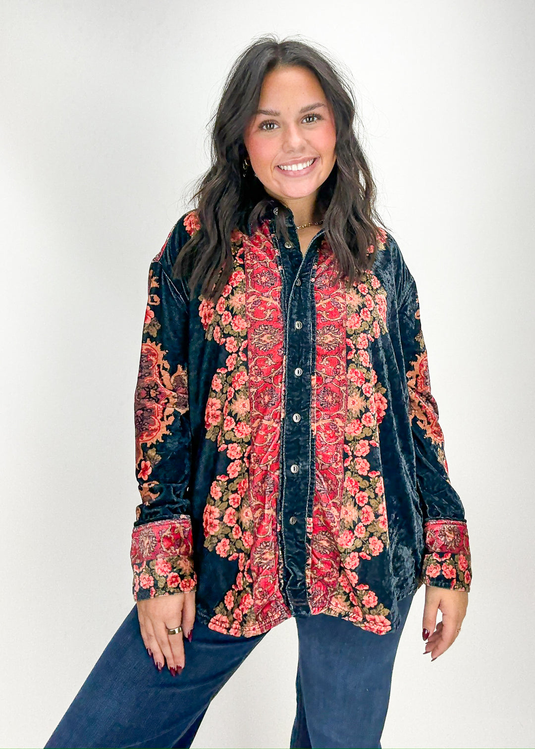Woman wearing a floral patterned shirt 