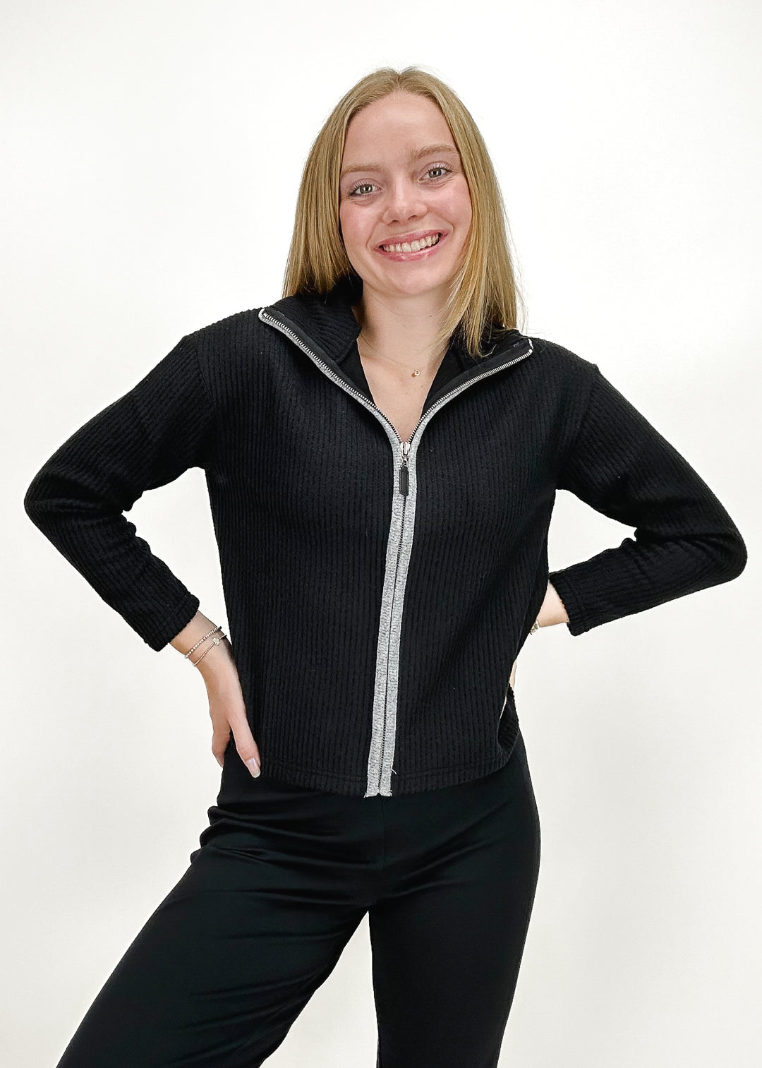 black knit zip up collared sweater with grey zipper trim