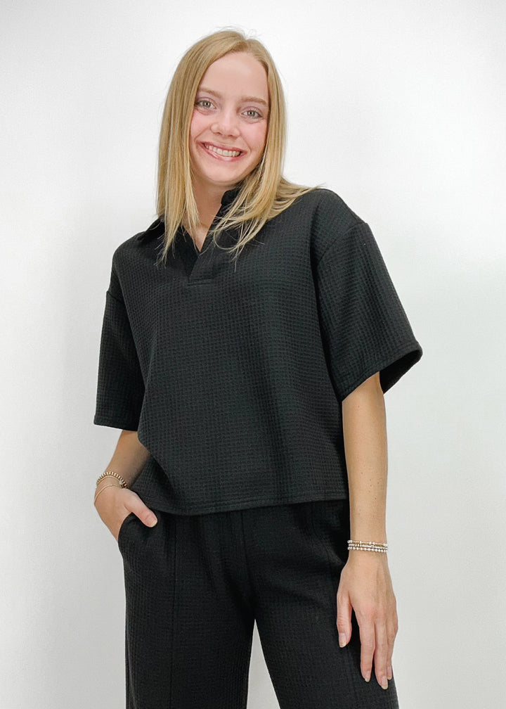 black waffle knit collared short sleeve women's polo