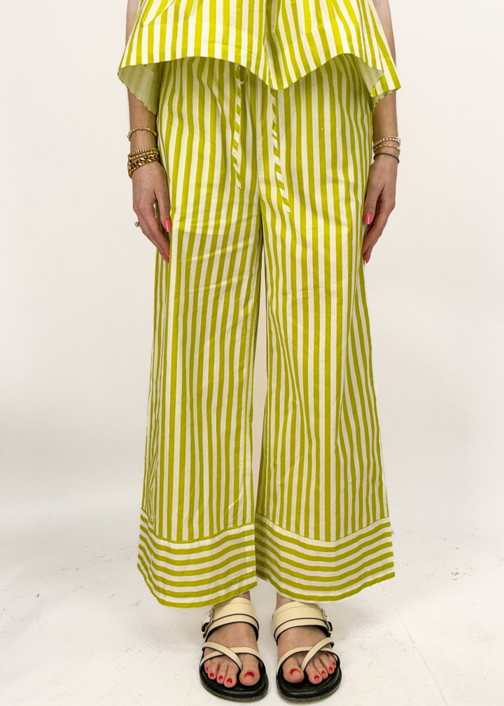 Person wearing a yellow and white striped outfit on a white background