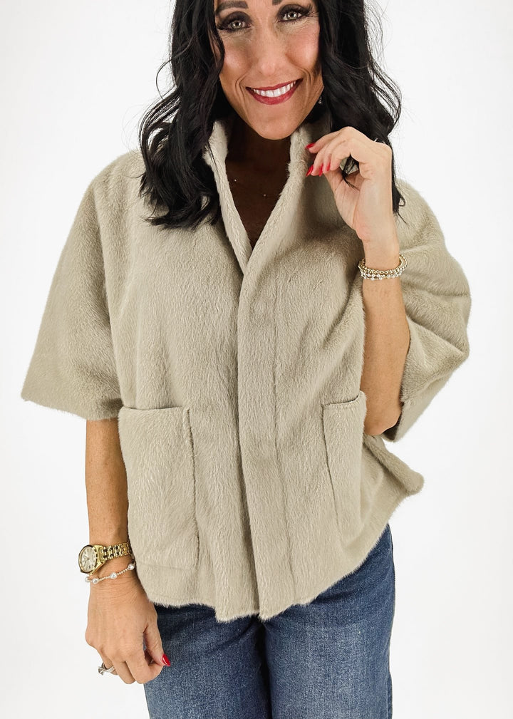 women's tan faux fur short sleeve cardigan styled with medium wash kut from the kloth jeans