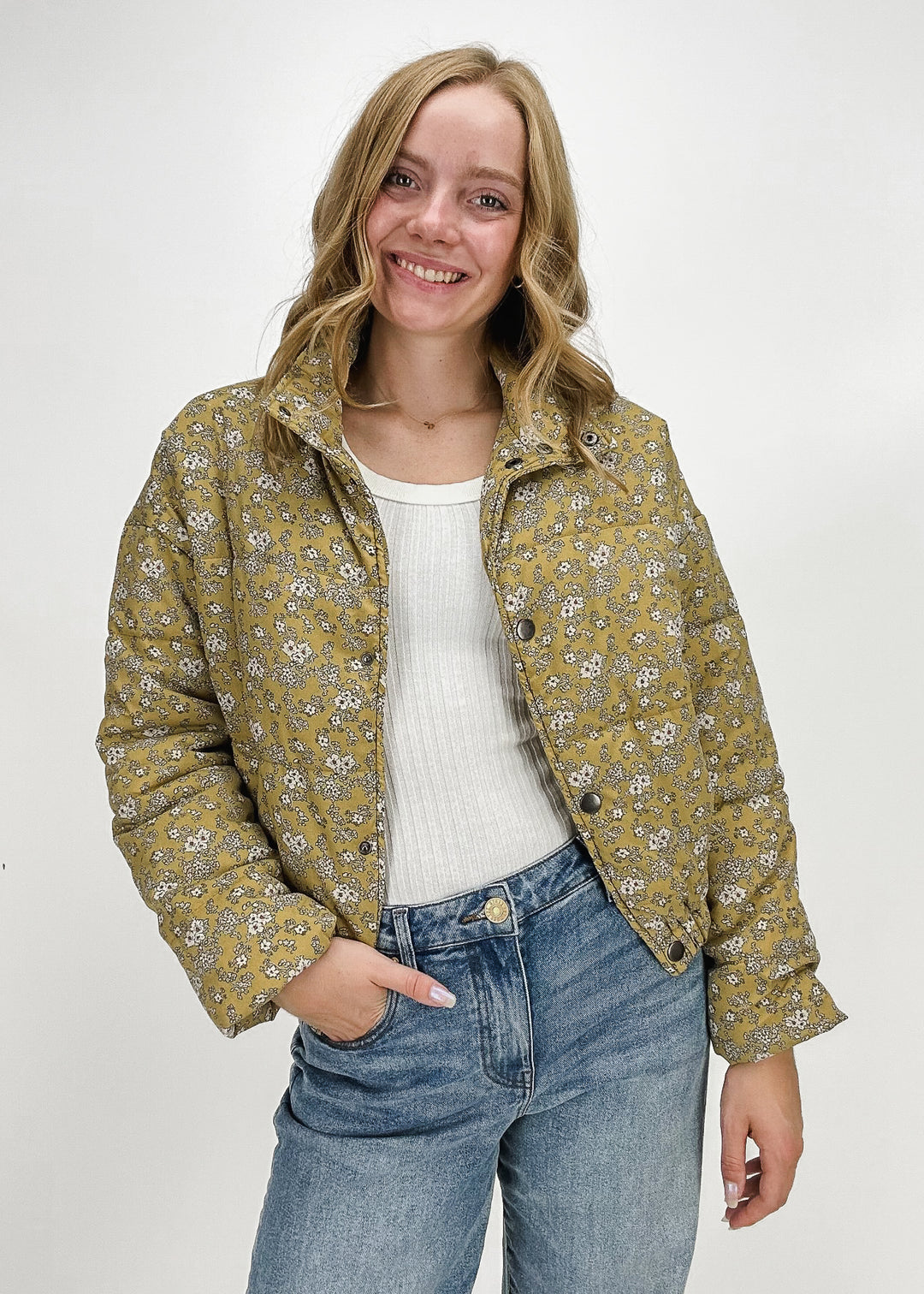 mustard yellow quilted puffer jacket with collar and front button closure