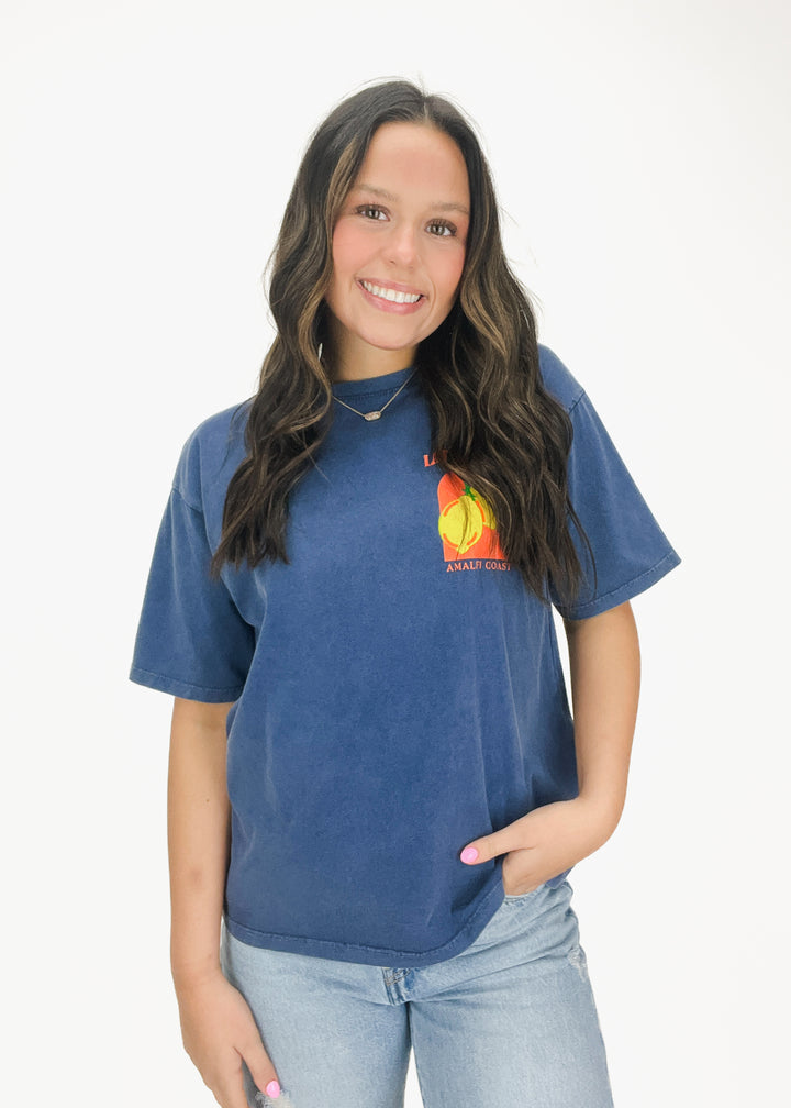 navy blue short sleeve tee with orange and yellow Amalfi coast chest and back graphics